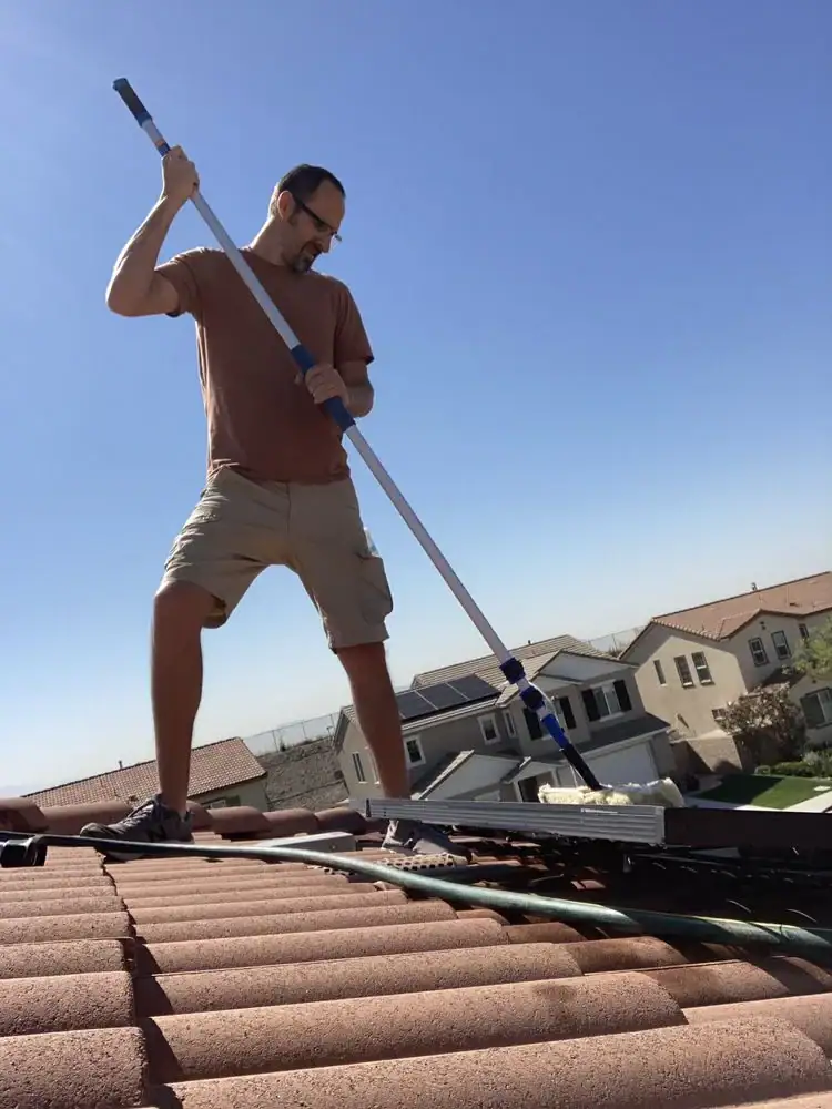 Cleaning Solar Panels Rooftop San Bernardino County California_1